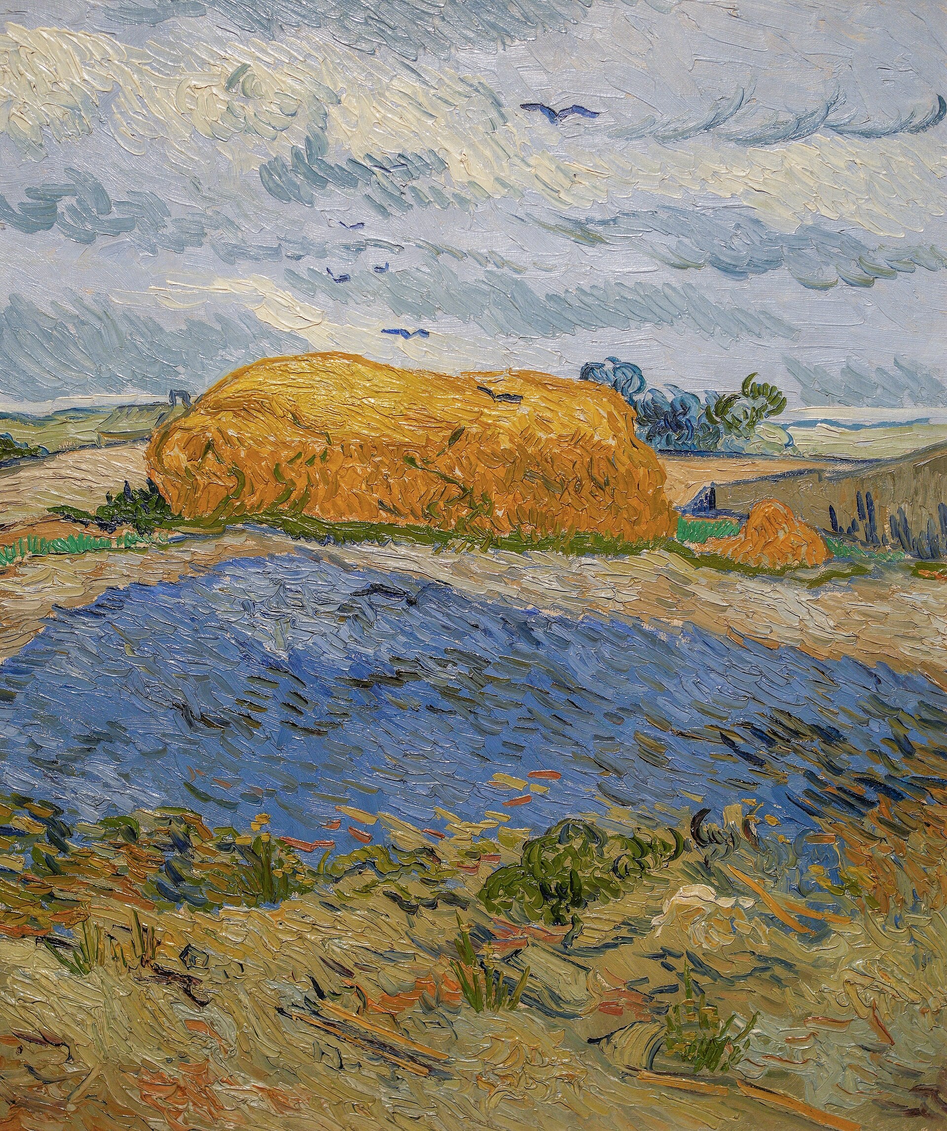 Fardos de feno sob um céu chuvoso - Vincent van Gogh