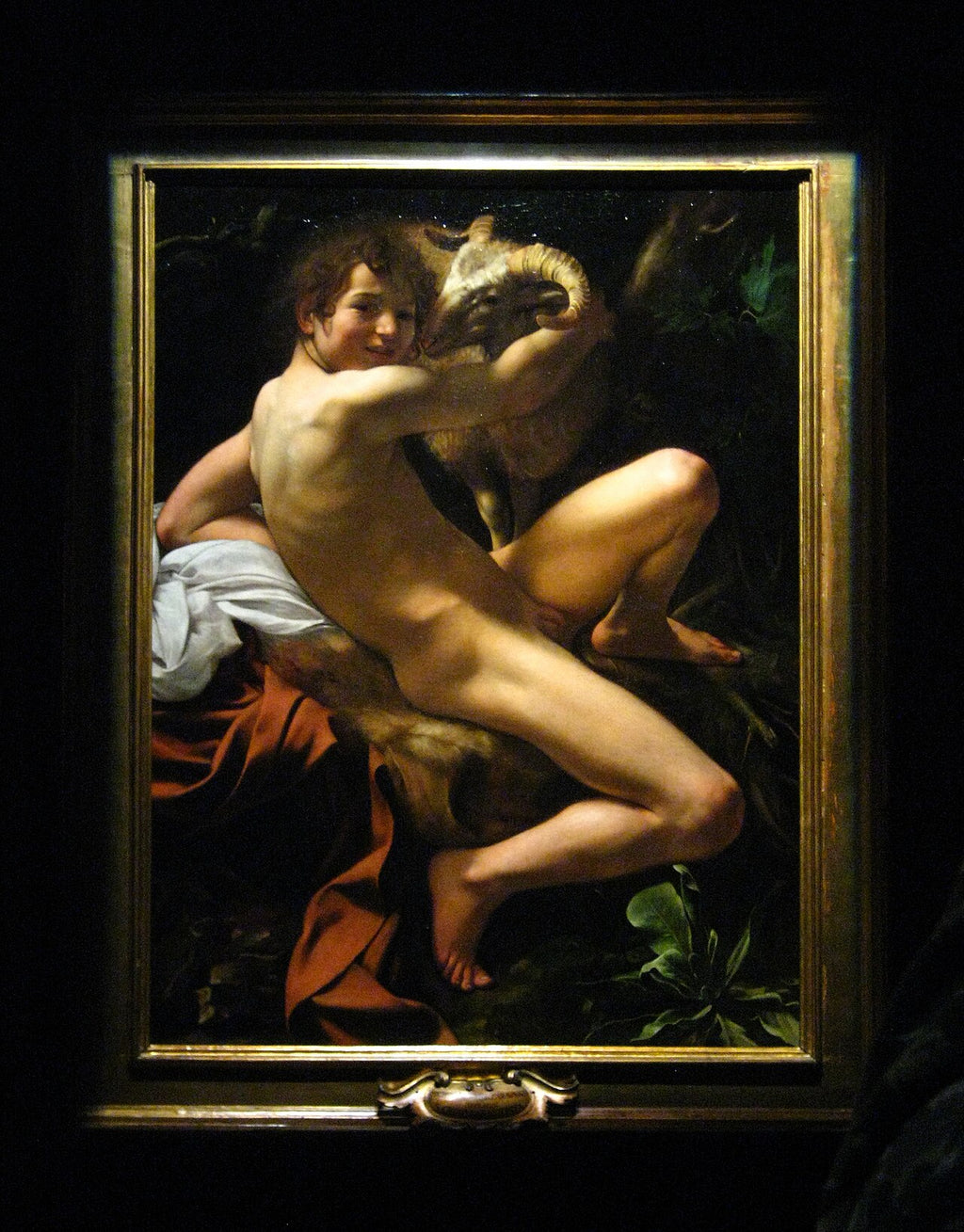 O Jovem São João Batista com o carneiro - Caravaggio