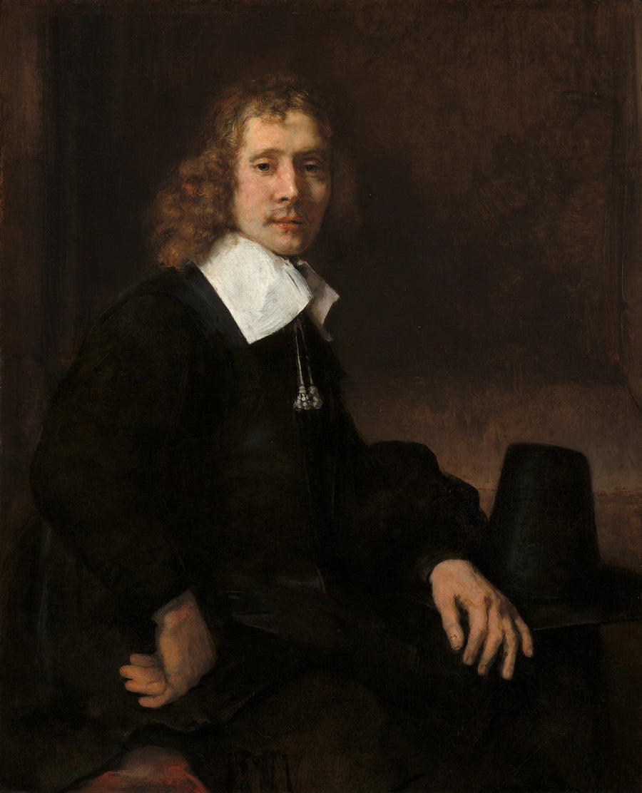 Um jovem sentado à mesa (talvez Govaert Flinck) - Rembrandt