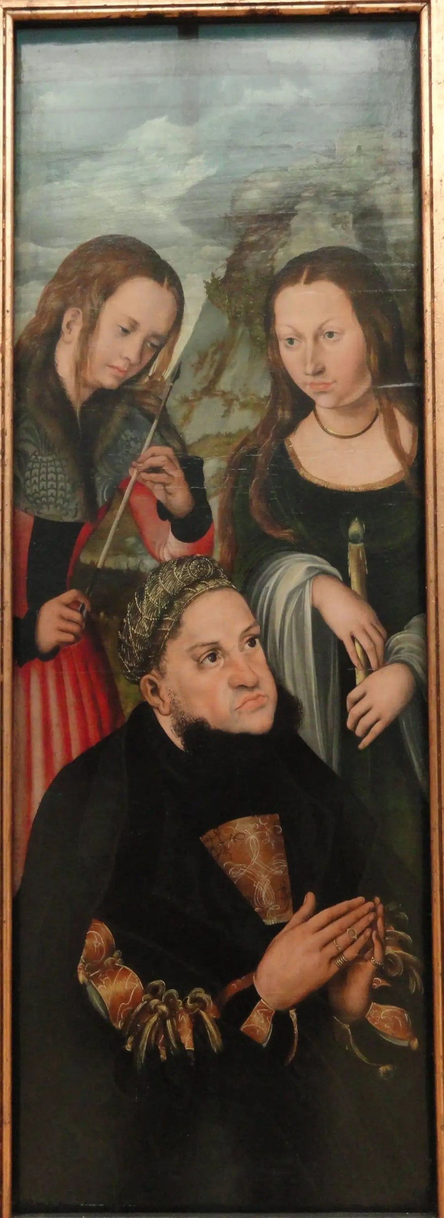 O eleitor Frederico, o Sábio da Saxônia (1463-1525), com as santas Úrsula (à esquerda) e Genevieve (à direita) - Lucas Cranach, o Velho