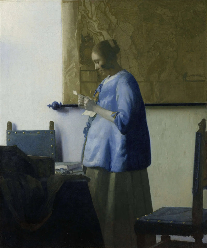 A Mulher de azul lendo uma carta - Johannes Vermeer