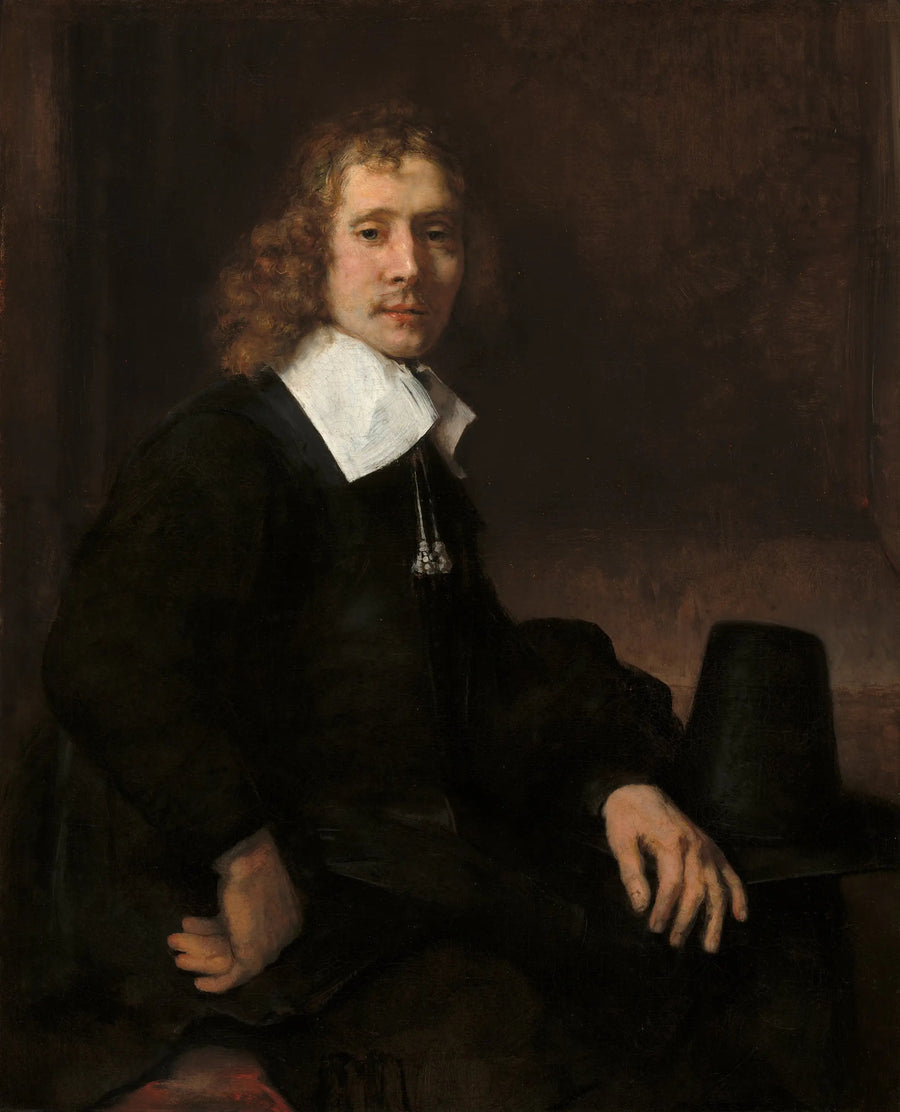 Um jovem sentado à mesa (talvez Govaert Flinck) - Rembrandt