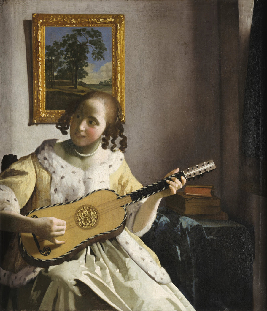 Uma mulher tocando violão - Johannes Vermeer